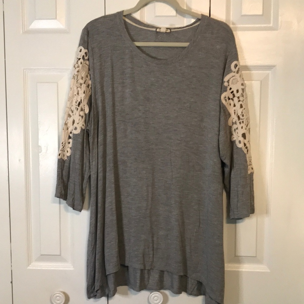 Ladies grey blouse with beautiful sleeves.